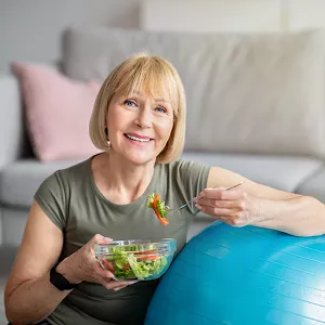 woman eating a salad 