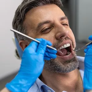 man visiting dentist