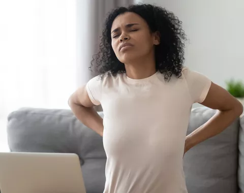 Woman stretching her back